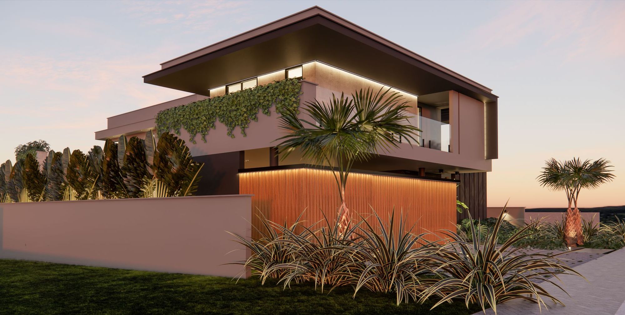 Residência com jardim e iluminação de fachada ao entardecer